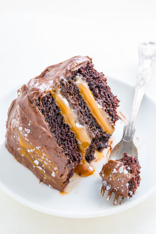 Three layers of Salted Caramel Chocolate Cake slathered in homemade Salted Caramel Chocolate Frosting. So decadent!