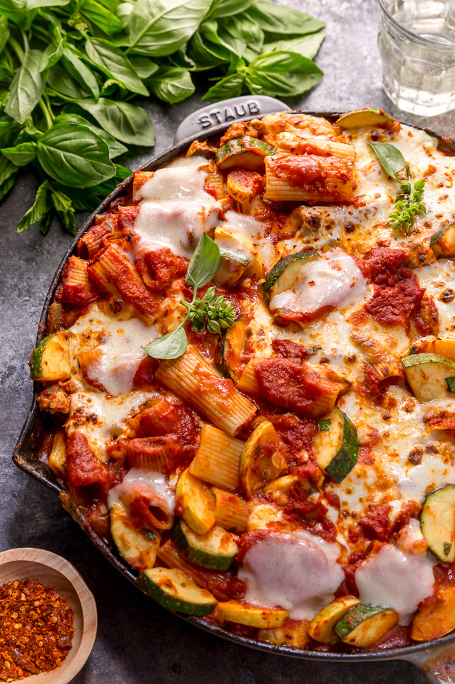 Preheat your oven to 350, because we're making Baked Rigatoni Fra Diavolo with Sausage and Zucchini for dinner tonight! Featuring a spicy tomato sauce loaded with fresh herbs, Italian sausage, tender zucchini, and tons of gooey cheese! This is Summer comfort food at its best!